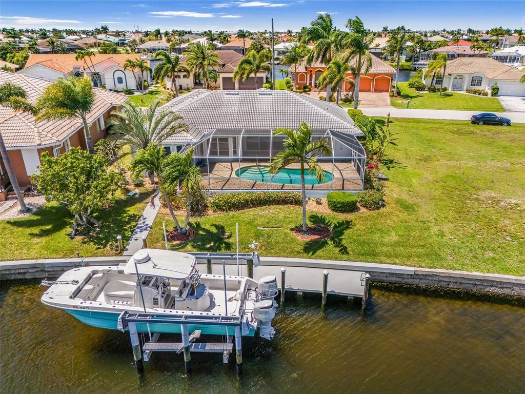 Photo of 1359 Pine Siskin Dr, Punta Gorda, FL 33950 (MLS # O6384119)