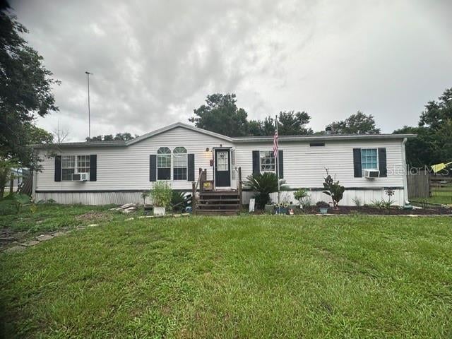 Photo of 446 Quail Street, Lady Lake, FL 32159 (MLS # G5116176)