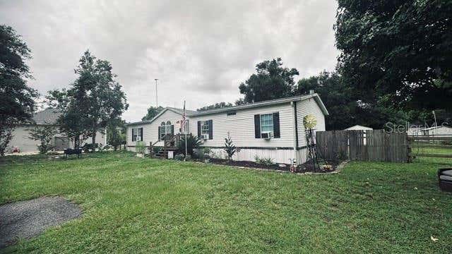 Photo of 446 Quail Street, Lady Lake, FL 32159 (MLS # G5116176)