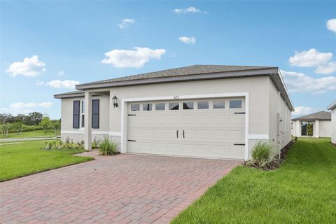 Photo of 325 Castle Drive, Lake Alfred, FL 33850 (MLS # O6277907)