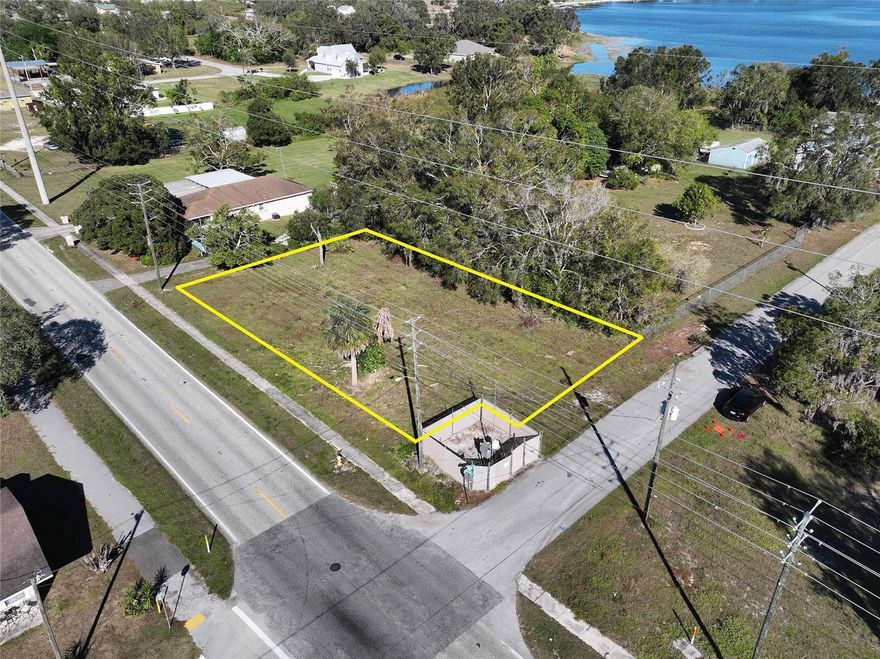 Build your dream home (and bring your boat!) on this oversized 0.32-acre lot at the corner of Memorial Drive and Joe Hilton St. Beautiful Lake Lotela is at the end of the street, and the public boat launch is a quick walk - only a block south - on Ben Hicks St. Recent boundary survey is available! Zoning is R-1A, which allows for stick build or modular single family homes with a minimum size of 1,200sqft. No mobile homes. Lift station at the SW corner of the property is maintained by Avon Park Utilities. Listing agent has an ownership interest in the property. Buyer should verify all details.