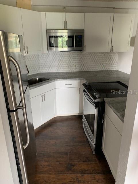 Well-kept 2BR/1BA condo in St. Petersburg featuring a beautifully remodeled kitchen with ceramic tile, stainless steel appliances, and modern finishes. The unit offers a functional layout with bright living spaces and tasteful updates throughout. Conveniently located near shopping, dining, and major roadways.