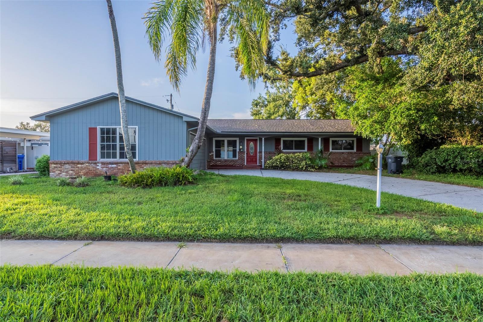 Welcome to Your Dream Home in Original Carrollwood! Discover this beautifully updated 3-bedroom, 2-bathroom home with a spacious 2-car garage, located in the highly desirable Original Carrollwood neighborhood. From the moment you step inside, you’ll appreciate the bright, open, and airy atmosphere enhanced by a fresh neutral color palette and all-new flooring throughout. The large living room flows seamlessly into the recently updated kitchen, which boasts brand-new cabinetry, luxurious quartz countertops, and a sleek stainless steel appliance package. A breakfast bar provides additional seating—perfect for casual dining or entertaining. The home also includes a spacious family room, offering plenty of room for additional living and entertaining. For added convenience, you’ll appreciate the dedicated mudroom—perfect for keeping everyday essentials organized and out of sight.Step through the sliding glass doors to your screened-in back porch, ideal for relaxing or enjoying the view of your fully fenced backyard complete with mature landscaping for added privacy. Key updates include a new roof in 2021 and a brand-new HVAC system in 2025, offering peace of mind for years to come. The spacious primary bedroom features a private en-suite bathroom that has been thoughtfully renovated with a large vanity for extra storage and a beautifully tiled walk-in shower. The second bathroom includes a tub/shower combination and a modern vanity with ample storage. Original Carrollwood is known for its vibrant and active lifestyle. Enjoy access to a wealth of amenities, including: scenic walking trails, tennis courts, parks and playgrounds, recreation center, the White Sands Beach on Lake Carroll, and boat ramp access for skiing, boating, and other water activities. Easy commute to the Tampa International Airport, major highways, Busch Gardens, downtown Tampa, Tampa’s Riverwalk, Sparkman’s Wharf and Armature Works. Conveniently located just minutes premier shopping, dining, hospitals, and top medical facilities—this home truly has it all. Don’t miss your opportunity to live in one of Tampa’s most sought-after communities. Schedule your private showing today!