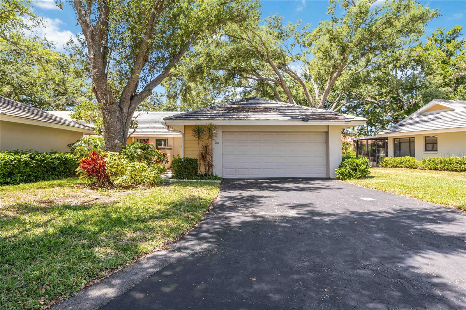 Tucked away on a quiet cul-de-sac in the serene and sought-after Myrtle Trace community, this charming 2-bedroom, 2.5-bath villa offers comfort, privacy, and style. Each spacious bedroom features its own en-suite bathroom, plus there’s an additional half bath for guests. A lush palm buffer between homes enhances the sense of seclusion, while custom draperies throughout add a touch of elegance.
Enjoy a beautifully renovated kitchen with solid wood cabinetry, high ceilings, and oversized closets that provide generous storage space. The enclosed back porch features newer windows—ideal for enjoying Florida’s breezes or staying secure during storms.
An oversized 2-car garage offers ample space for vehicles and extra storage. The A/C system, installed in 2016, has been regularly maintained for peace of mind.
This move-in ready villa blends comfort and convenience in a quiet, established neighborhood. Don’t miss your chance to call Myrtle Trace home!