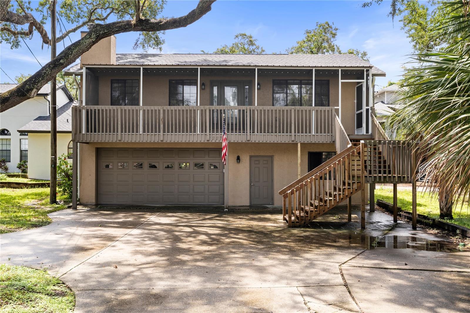 Charming 2 Bedroom Retreat with Bonus Garage Space in Oldsmar!
Discover this unique and inviting 2 bedroom, 1.5 bathroom home situated above a spacious garage and workshop—perfect for extra storage, hobbies, or creating your dream bonus space. Nestled in the heart of Oldsmar, this property combines the peaceful charm of small-town living with close proximity to the water and nature.
Surrounded by lush greenery, the home feels like a private hideaway, offering a serene backdrop for your everyday life. Enjoy your morning coffee or unwind in the evenings on one of the two screened decks—front and back—providing the perfect indoor-outdoor living experience.
Inside, you’ll find an updated kitchen with modern finishes and plenty of counter space for cooking and entertaining. The cozy living area features a fireplace that adds warmth and character, making this space feel like home.
Located just minutes from waterfront parks, walking trails, and all the local charm located in Oldsmar, this gem is ideal for those seeking comfort, privacy, and versatile space. Come experience peaceful living with plenty of room to make it your own!