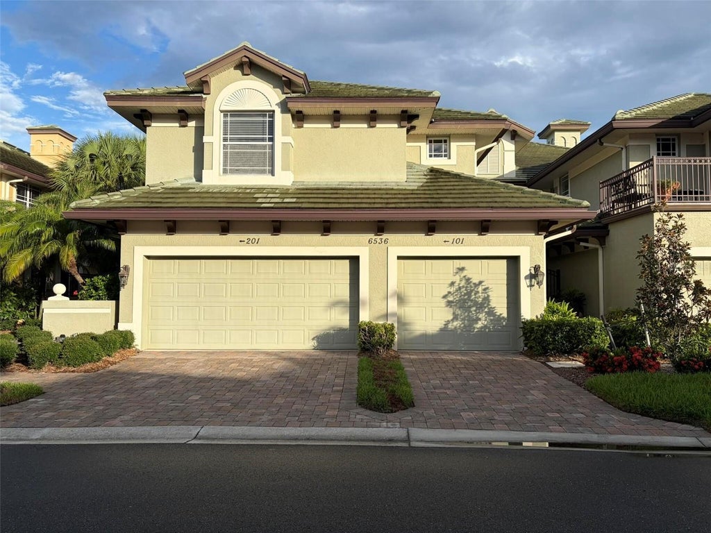 Photo of 6536 Moorings Point Circle #101, Lakewood Ranch, FL 34202 (MLS # O6423762)