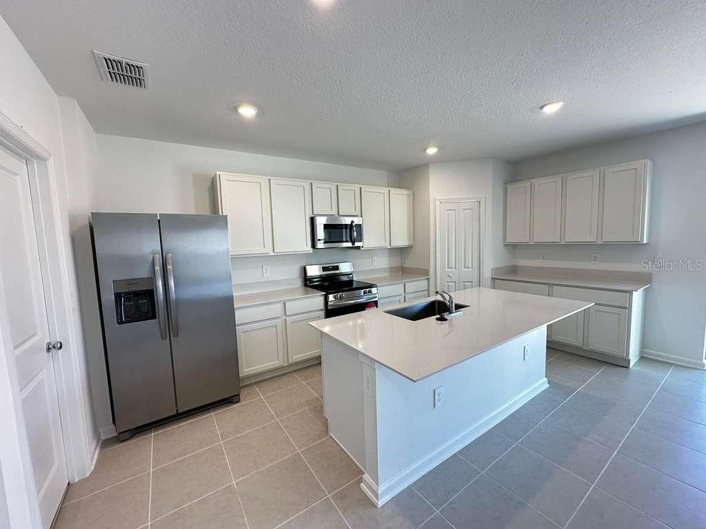 Photo of 5431 Meadow Walk Drive, Davenport, FL 33837 (MLS # O6387451)