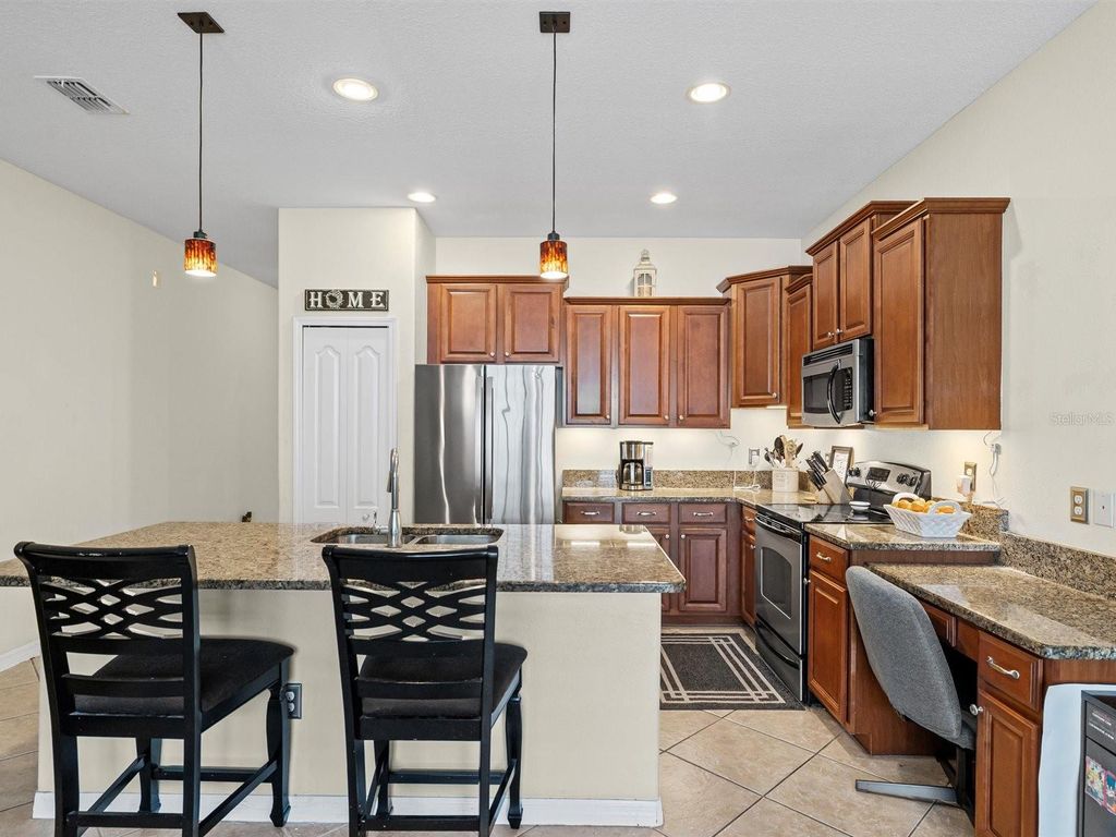 Photo of 9588 Trumpet Vine Loop, Trinity, FL 34655 (MLS # W7879643)