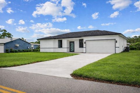 Photo of 1614 Abalom Street, Port Charlotte, FL 33980 (MLS # O6344811)