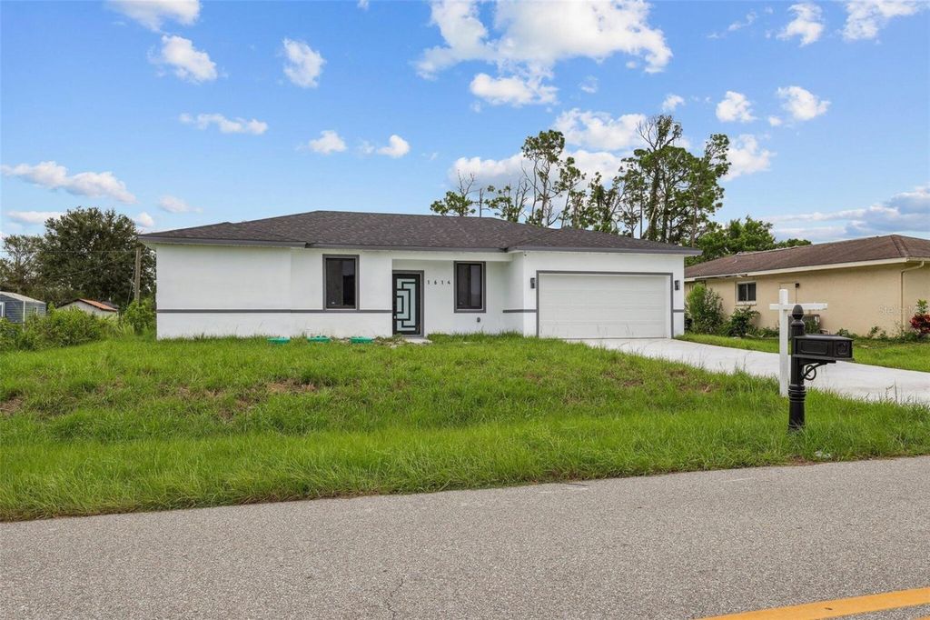 Photo of 1614 Abalom Street, Port Charlotte, FL 33980 (MLS # O6344811)