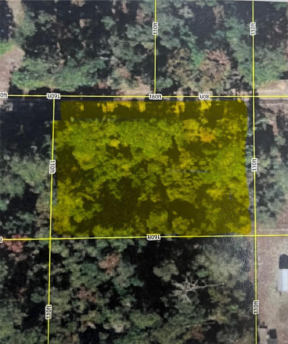 Located in remarkable D&J Campsites. This property boasts over a quarter of an acre and privacy. Whether you want to bring your RV for a weekend or build your home. This property offers a variety of options. This property won't last long.