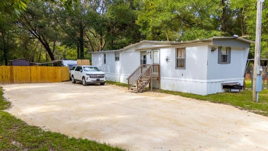 This 1981 single-wide manufactured home offers a comfortable two-bedroom, one-bath split floor plan with a tenant in place. Recent updates include a new well (2021), A/C system (2021), new refrigerator, new range hood, new range and shed (2025), and a driveway/backyard feature (2025).

The property is fully fenced with a combination of chain link and privacy fencing, and the fenced-in backyard is perfect for grilling, entertaining, and enjoying the outdoors. Additional features include electric service provided by Duke Energy and an RV setup with 30-amp electrical service, water hookup, and sewer hookup/dump station. This home has been relocated to its current lot (“reset”). Please do not disturb the tenant. All showings must be scheduled in advance by appointment only.