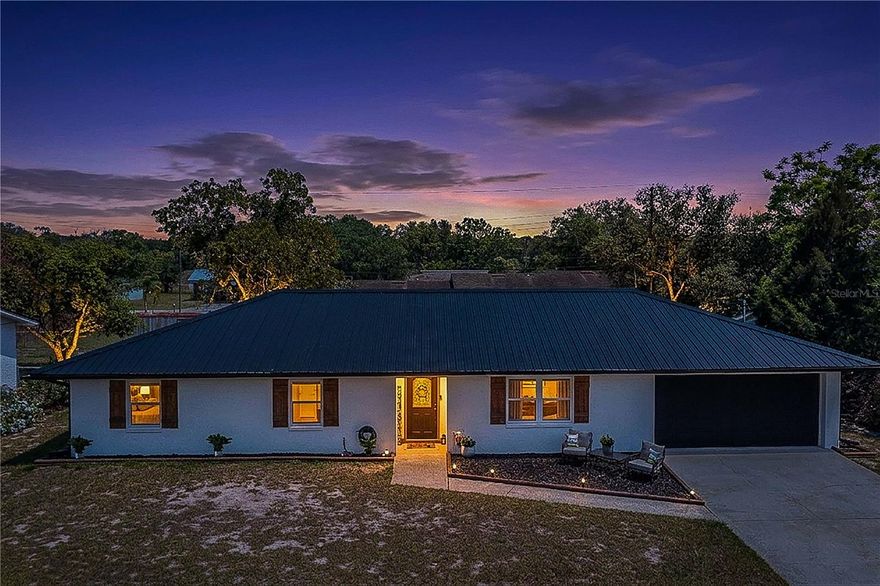 Welcome home to this beautifully maintained 3-bedroom, 2-bath ranch-style property featuring a brand-new metal roof, shutters, and seamless gutters for added durability and curb appeal. Inside, you’ll find a bright open-concept layout with a spacious kitchen at the heart of the home, complete with a center island and cooktop with overhead hood—perfect for entertaining and everyday living.

This home offers the convenience of an inside laundry room and a two-car garage. The main living areas, including the living room, dining room, and kitchen, feature tile flooring, while the bedrooms provide cozy carpet underfoot.

Step outside to enjoy a nicely sized, fully fenced backyard, ideal for relaxing or hosting gatherings, complete with a fire pit and even a chicken coop for added charm.

Conveniently located near schools, shopping, and medical facilities, this move-in-ready home is priced to sell—don’t miss your opportunity to make it yours!