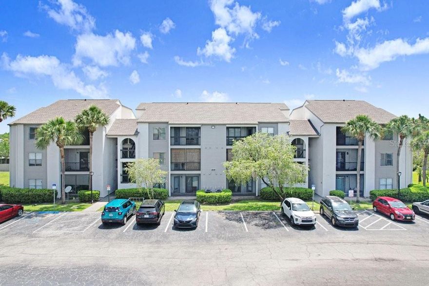 Discover comfort and convenience at Cascades at Kissimmee with this well-maintained 2-bedroom, 2-bath condominium offering approximately 1042 square feet of thoughtfully designed living space. The interior features an open, airy floor plan with abundant natural light, a welcoming living and dining area, and a stylish galley kitchen complete with breakfast bar and updated appliances—ideal for both everyday living and entertaining. The generously sized primary bedroom includes a walk-in closet.  Enjoy outdoor relaxation on the screened balcony, which also provides additional storage, plus the added convenience of an in-unit washer and dryer. Residents enjoy access to community amenities including a swimming pool and clubhouse. Centrally positioned near major roadways, shopping, restaurants, and entertainment, with easy drives to The Loop, area attractions, and Orlando International Airport. A great option for owner-occupants or investors alike—ready for immediate occupancy. Schedule your private tour today.