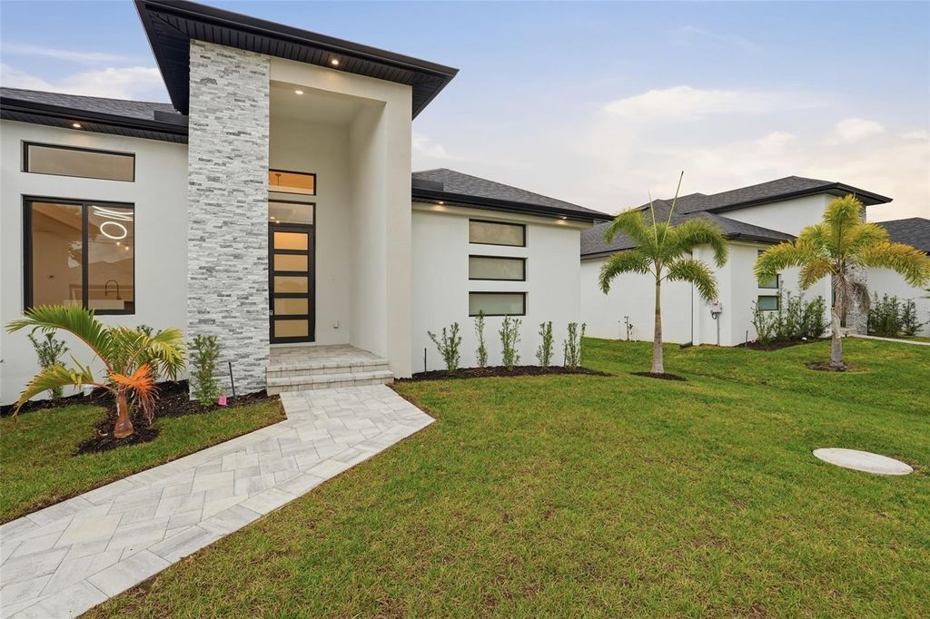 Photo of 9402 Arrid Circle, Port Charlotte, FL 33981 (MLS # O6370942)