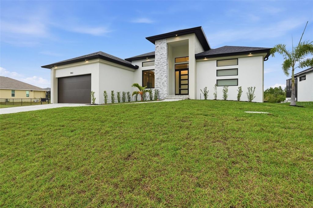 Photo of 9402 Arrid Circle, Port Charlotte, FL 33981 (MLS # O6370942)