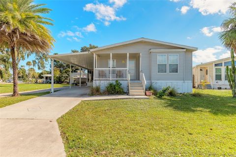 Photo of 152 Red Bass Lane, Edgewater, FL 32141 (MLS # V4945606)