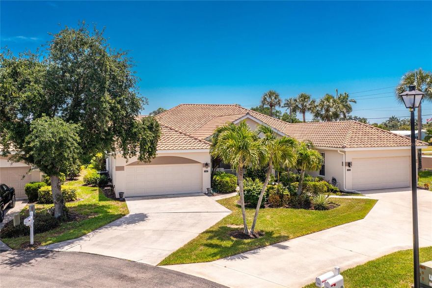 Impressive **FURNISHED** villa located at desirable Waters Edge Two at Peppertree Pointe, a private gated community along the Caloosahatchee River just minutes from the Gulf of Mexico. This light and bright villa offers 3 Bedrooms Plus Den, 2 full bathrooms and 2 Car Garage. There is an open and split bedroom floor plan with Great Room, Dining Room, well appointed Kitchen, Inside Utility and spacious 422 SF enclosed rear porch. Foyer with diagonal lay tile leads to the spacious Great Room with high grade wood floor and crown molding and has pocket sliding glass doors to the enclosed porch. There is a Dining Room and Den- also with wood flooring- off of the Great Room. The large eat in Kitchen features white cabinetry, granite counters, tile backsplash, pantry closet, double sink and stainless appliances: French door refrigerator, dishwasher, oven/range and microwave. The laundry closet has a stacked washer and dryer. The master bedroom suite offers a tray ceiling, walk in closet and private bathroom with dual sinks, vanity, garden tub, separate walk in shower and bidet. There are two additional bedrooms with good sized closets and one bedroom offers access to the lanai. The guest bathroom has a tub/shower combo. Other features include hurricane shutters, rain gutters, crown molding, ceiling fans, tile roof, front door with transom window and sidelights, large windows. high grade wood flooring throughout- new within the last year. New air conditioner within the past year. New roof within the past 2 years. The villa is beautifully furnished. Waters Edge Two is a gated community with 2 community pools, tennis courts, pickleball courts, private marina with wet and dry slips available for lease, a boat launch, private beach, trailer storage and pavilion area. This is a wonderful home in a great community!