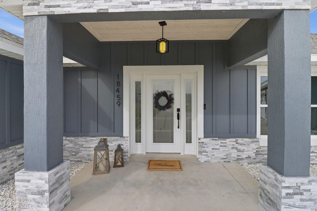 Photo of 18459 SW 66th Loop, Dunnellon, FL 34432 (MLS # OM713265)