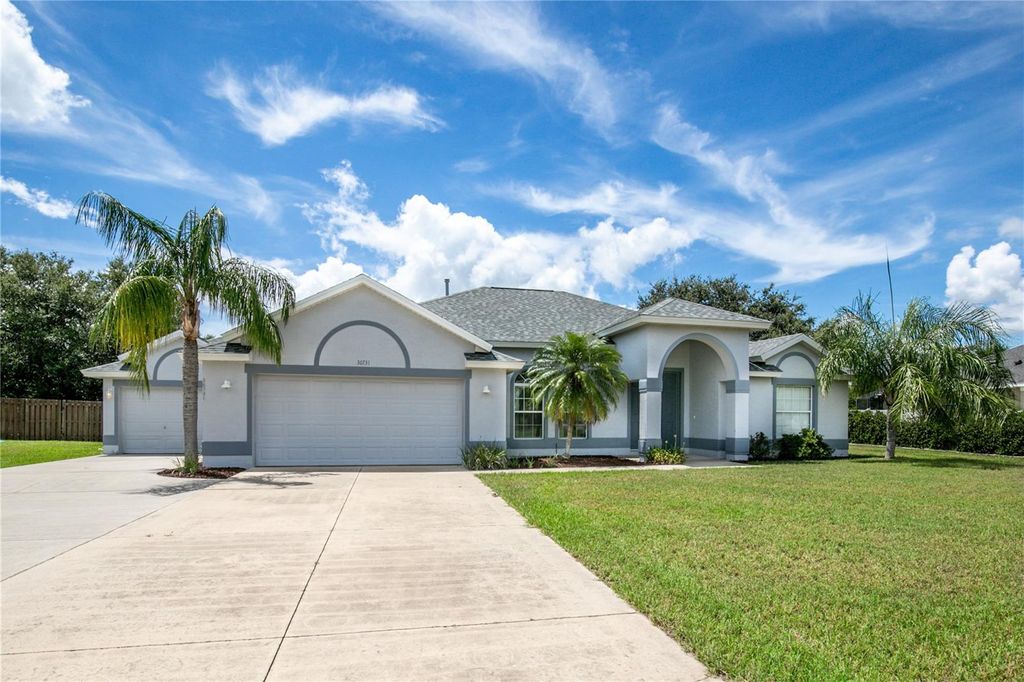 Photo of 36731 Tropical Wind Lane, Grand Island, FL 32735 (MLS # O6334770)