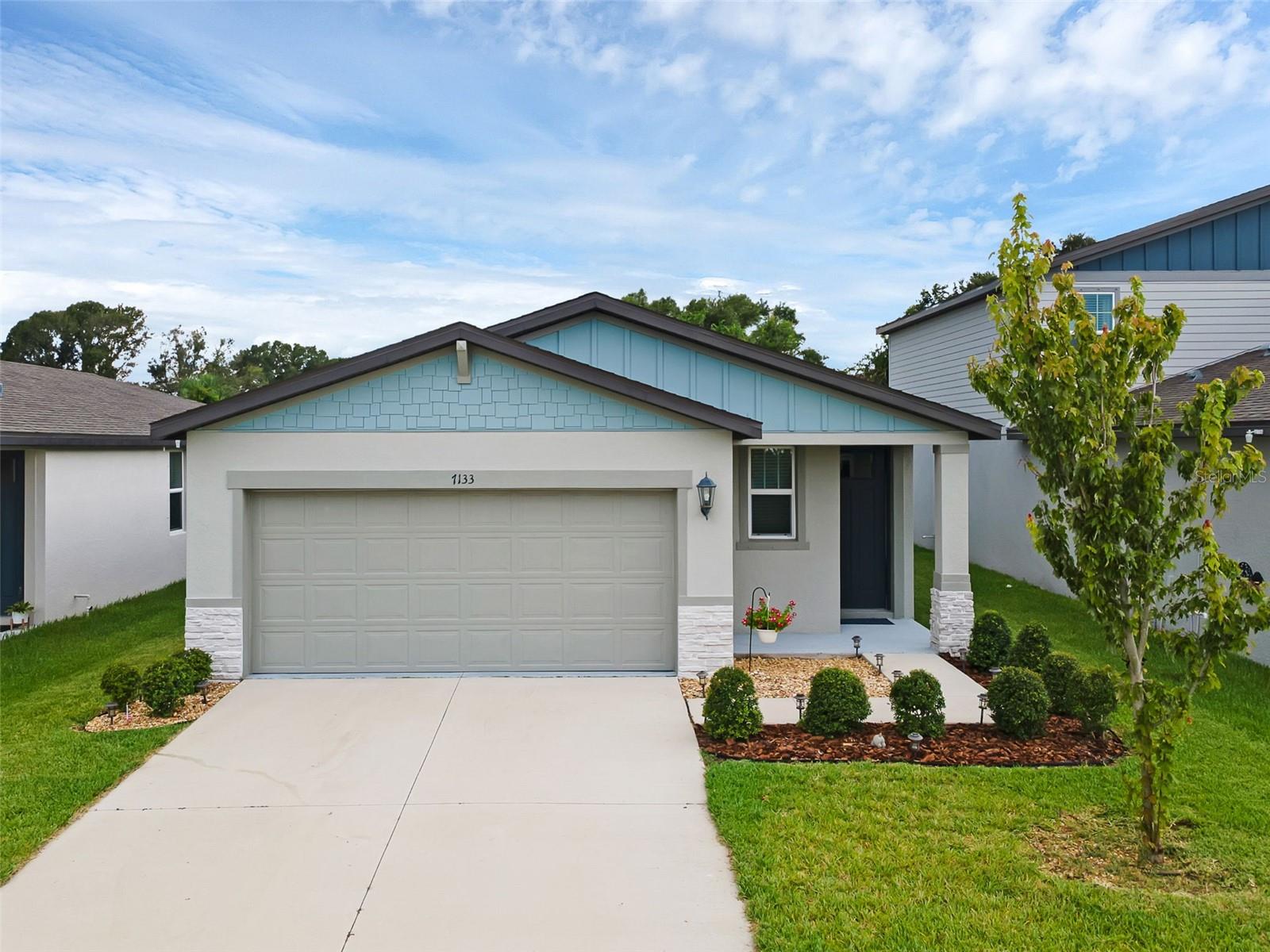 Welcome to your Parrish paradise! Shows just like a Model Home!!! Why wait for new construction, when this is already completed! This 3 bedroom, 2 bath home feels practically brand new at just two years young, offering an inviting open floorplan designed with both comfort and style in mind. The kitchen is a true centerpiece, featuring gleaming granite countertops, stainless steel appliances, and a spacious island that’s perfect for family gatherings, casual dining, or entertaining with friends. The appliances are all in amazing condition and the dishwasher has never been used!! In the primary suite, a new, sleek trackless shower door adds a touch of luxury, and throughout the home you’ll find that everything has been thoughtfully cared for and remains in excellent condition. Move-in ready and modern, this home makes life easy. The neighborhood is equally impressive, with amenities designed to enrich your lifestyle. Parrish Community Park offers wide open green spaces, a playground for little ones, a splash pad for warm Florida days, and even an amphitheater with pavilion rentals that host live music, weddings, festivals, and special events. It’s a true hub for community fun and connection, giving you more than just a house — it’s a place where memories are made. When it comes to location, this home checks every box. Parrish provides a balance of peaceful small-town charm while keeping you close to the action. You’re only a short drive to the Gulf Coast beaches, where sun, sand, and surf await. Tampa is within easy reach for professional sports, concerts, and year-round entertainment, while Sarasota is nearby with its vibrant arts scene, fine dining, and cultural attractions. Festivals, farmer’s markets, and outdoor adventures are all part of the lifestyle here, making this home an ideal choice for those who want both relaxation and recreation at their fingertips. **Ask about our preferred lender incentive!!**