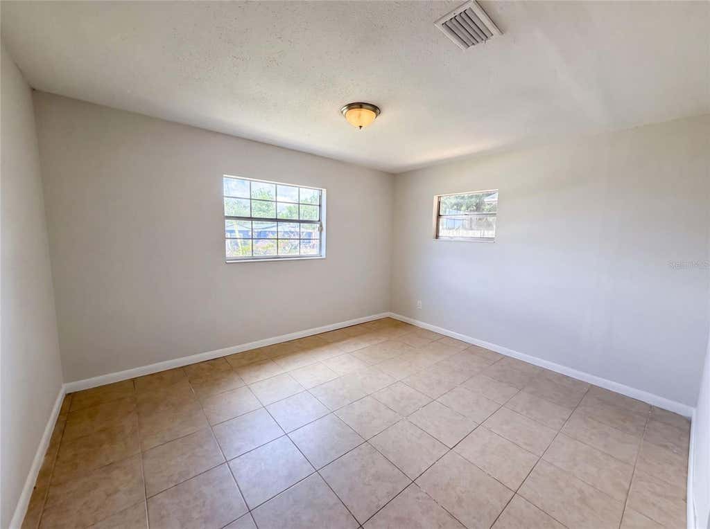Photo of 7018 Lynwood Drive, Tampa, FL 33637 (MLS # O6432860)