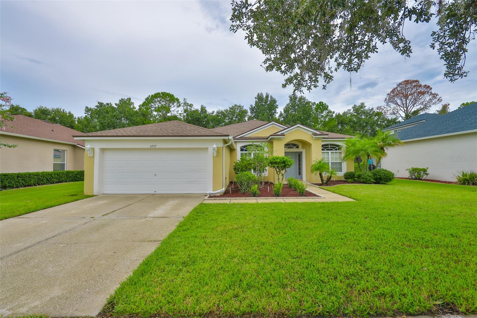 Welcome to 5717 Riva Ridge Drive, where comfort and style meet in perfect harmony. Priced at $465,000, this stunning 3-bedroom, 2-bathroom home offers 2,184 square feet of thoughtfully designed living space. Tucked away on a serene and quiet street, the home hums with the peacefulness of suburbia while still being conveniently close to all the amenities you desire.
As you step inside, feel the open flow that guides you from room to room, each space inviting you to imagine the life you've always dreamed of. For those who appreciate the finer details, custom woodwork has been added throughout the home. The open-concept design ensures a seamless transition from cooking to dining to relaxing, making it ideal for both entertaining and quiet nights in.
Retreat to the master suite, a sanctuary of peace and comfort. Here, the generous layout provides ample room for relaxation, while the ensuite bathroom offers plenty of space for two people to enjoy!
The additional bedrooms provide flexibility for growing families, home offices, or guest accommodations, each offering abundant natural light and ample storage. Imagine the possibilities as each room adapts to your evolving needs.
Outside, the yard offers a blend of open space and privacy, perfect for outdoor gatherings or simply enjoying a moment of solitude. The lush landscape invites you to explore the potential of your own outdoor retreat, whether it be gardening, play, or relaxation.
5717 Riva Ridge Drive isn't just a house; it's a lifestyle. From the pristine golf course, to the proximity to local shopping, restaurants and entertainment, everything you could want is yours within minutes. Located conveniently between SR 54 and SR56 gives you easy access to I75 and I275 giving you options to go anywhere you desire, quickly! The local schools of Veterans Elementary, Cypress Creek Middle, and Cypress Creek High School are highly sought after! Don?t miss this opportunity to make it your own.
