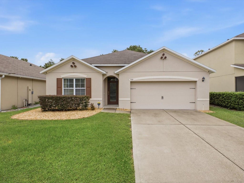 Photo of 209 Tanglewood Drive, Davenport, FL 33896 (MLS # O6449911)