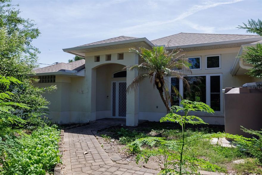 A Holistic Wellness Homestead in the Heart of Palm Coast

This home was created for the truly holistically minded homeowner — the one who cares deeply about clean air, clean food, clean water, and living with more intention every day.

Set on nearly half an acre inside Palm Coast, this property has been transformed into a holistic wellness homestead for its next owner. Here, healthy living is not just a concept — it is built into the land, the systems, and the daily rhythm of the home.

For years, the soil has been tilled, restored, and enriched to support a thriving fruit-and-vegetable landscape. Step outside and pick fresh fruit, vegetables, herbs, and garden harvests from your own backyard. Enjoy sunflowers, pollinator-friendly flowers that attract bees, fruit-bearing plants, and a virtual forest of banana trees — all creating a lush, food-producing sanctuary right in the city.

This is the kind of property where mornings begin with fresh air on the screened lanai, filtered water from every tap, and a view of a garden that has been intentionally cultivated for health, beauty, and sustainability. The natural rainwater barrel system provides reclaimed rainwater to help nourish the garden, while the private well and Pelican whole-house water filtration system support cleaner water throughout the home.

Inside, the healthy-living story continues with clean-air systems, including a high-efficiency central air conditioning system and full air ductwork replacement completed in 2026 for fresher indoor air distribution. The fully owned Tesla solar panel system is paid in full and helps keep the electric bill remarkably low, typically running approximately $30 to $35 per month.

The home itself has been beautifully maintained and thoughtfully upgraded, including a newer roof, updated gutters, newer water heater, updated guest bedroom flooring, porcelain tile on the screened lanai, custom Italian porcelain tile in the guest shower, Italian porcelain tile across the garage floor, quality kitchen appliances, an additional premium refrigerator for extra garden harvest storage, and a new LG washer and dryer added in 2026.

Fully enclosed with a premium vinyl privacy fence, the backyard feels like a private wellness retreat — peaceful, productive, and purposefully designed.

This is more than a home. It is a holistic wellness homestead for the buyer who wants to grow food, drink cleaner water, breathe cleaner air, reduce utility dependence, and live closer to the land while still enjoying the convenience of Palm Coast living.