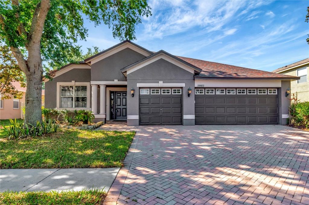 Photo of 29822 Boyette Oaks Place, Wesley Chapel, FL 33545 (MLS # TB8372608)