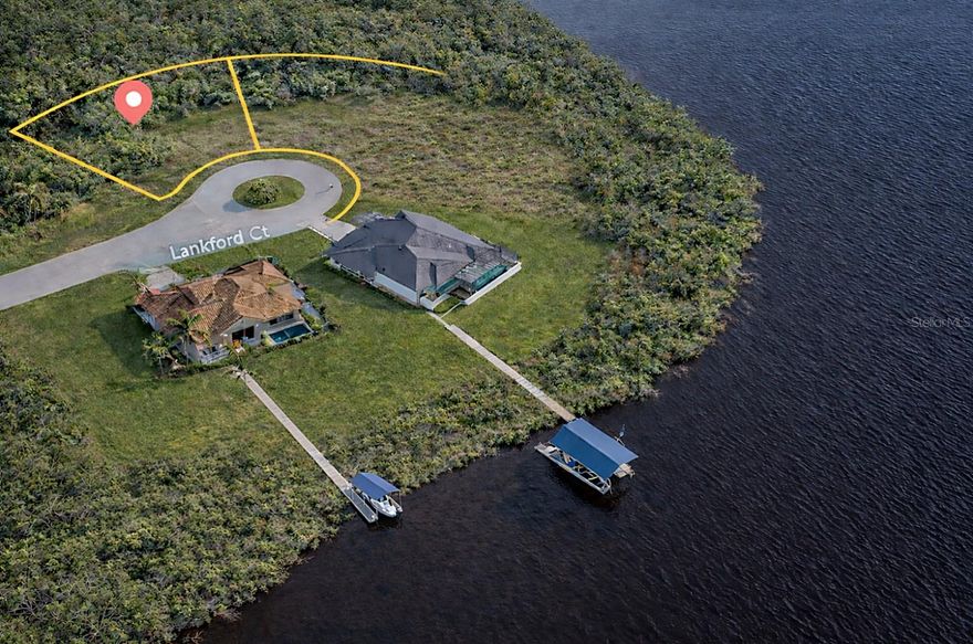 Build at the end of a quiet cul-de-sac in an established Port Charlotte neighborhood. This vacant residential lot offers privacy, natural surroundings, and a peaceful setting without the traffic of through streets. Located in an area known for its relaxed coastal lifestyle, the lot sits near waterways and outdoor recreation while avoiding the added maintenance and restrictions that come with direct waterfront properties. It’s an ideal opportunity to design and build a home that fits your vision. The cul-de-sac location provides minimal traffic and a quieter atmosphere. Surrounding greenery offers a natural buffer and added privacy. Nearby homes reflect a well-established residential setting, making this a strong option for new construction. The lot is flat and usable, suitable for a custom build. Utilities are available at the street. No HOA is reported, though buyers should verify. Zoned RSF 3.5, the property allows for single-family residential use, making it well suited for a primary residence, a seasonal or second home, or a long-term new construction investment. You get flexibility in a location that continues to see steady demand. Situated in Port Charlotte, the property is close to shopping, dining, parks, boating areas, and outdoor recreation, with convenient access to Gulf Coast beaches and waterways. Lots like this are quiet, private, and close to everything Port Charlotte has. Bring your builder and create a home that fits your lifestyle.