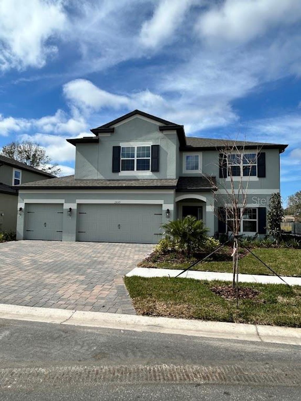 Photo of 20143 Oriana Loop, Land O Lakes, FL 34638 (MLS # J986554)