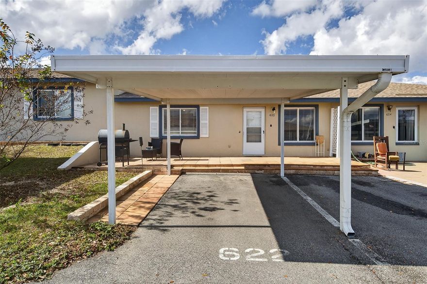 Welcome home to this beautifully renovated 2 bedroom, 2 bathroom residence that truly stands out from the rest. From the moment you step inside, you’ll notice the bright, open living space featuring stylish wood-look flooring, modern lighting, and a layout designed for both comfort and entertaining.

The spacious primary suite features sliding glass doors that lead to a screened, covered lanai—now thoughtfully split to create a versatile bonus room, perfect for a home office, hobby space, or relaxing retreat. Step outside to the tiled patio, ideal for morning coffee, evening gatherings, or weekend BBQs.

Enjoy low-maintenance living in a community that offers assigned covered parking, a community pool, and direct lake access to Lake Smart with a boat ramp—perfect for fishing, boating, and enjoying the Florida lifestyle. Conveniently located near shopping, dining, and medical facilities, this home offers both comfort and convenience.

This move-in-ready unit is a rare find. Schedule your private showing today before it’s gone.