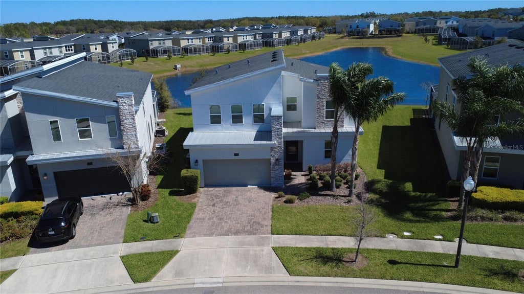 Photo of 345 Ocean Course Avenue, Davenport, FL 33896 (MLS # S5160532)