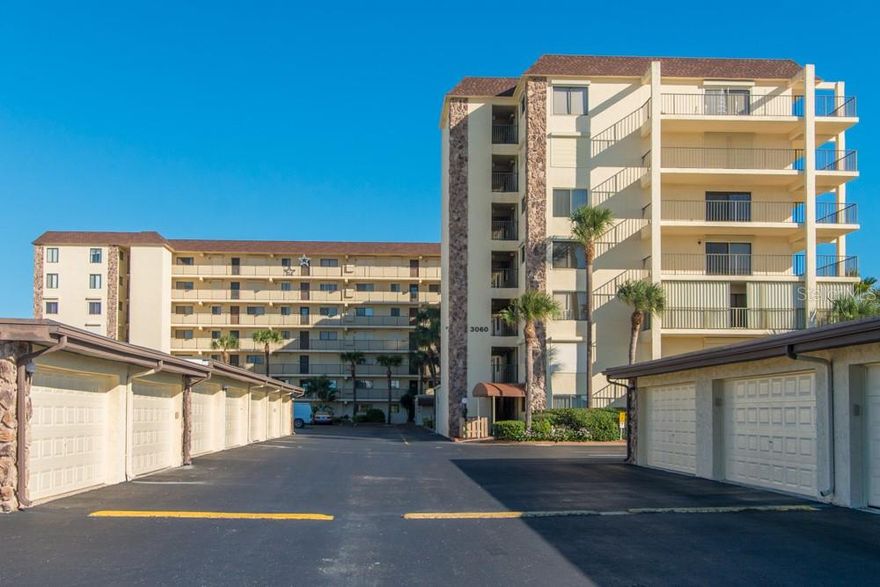 The LOWEST-PRICED direct ocean unit with a garage in Cocoa Beach and Cape Canaveral - fully furnished, VA financing approved, first-floor condo in Windward East on Florida's Space Coast. Wake up steps from the Atlantic Ocean and walk to the beach through the community's secured access. Tile floors in the living, kitchen and bath areas; bedroom features a spacious walk-in closet. In-unit stackable washer/dryer and a 1-car garage included. Major systems already done: 2021 AC, 2022 roof, 2024 water heater. First floor means easy in and out - perfect if you have a dog. Windward East amenities include a heated pool, sauna, fitness room, tennis courts and clubhouse. 30-day minimum rental policy makes this a smart seasonal income opportunity. Best part: the seller has already paid the concrete restoration assessment in full. Minutes to downtown Cocoa Beach, the Pier, dining, shopping, and parks. Primary home, 2nd home, or beachside escape - this condo checks every box. Schedule today!