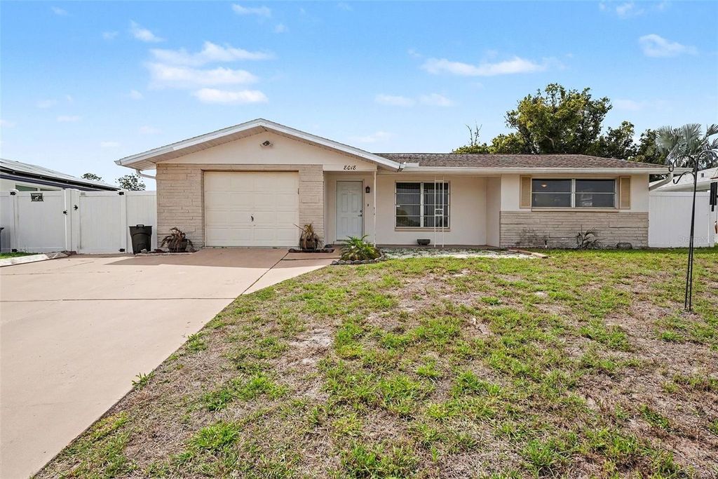 Photo of 8018 Valmy Lane, Port Richey, FL 34668 (MLS # TB8486171)