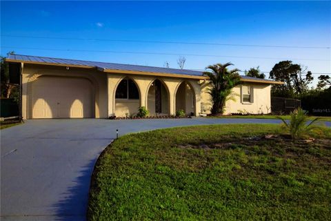 Photo of 389 Millport Street NW, Port Charlotte, FL 33948 (MLS # A4647971)