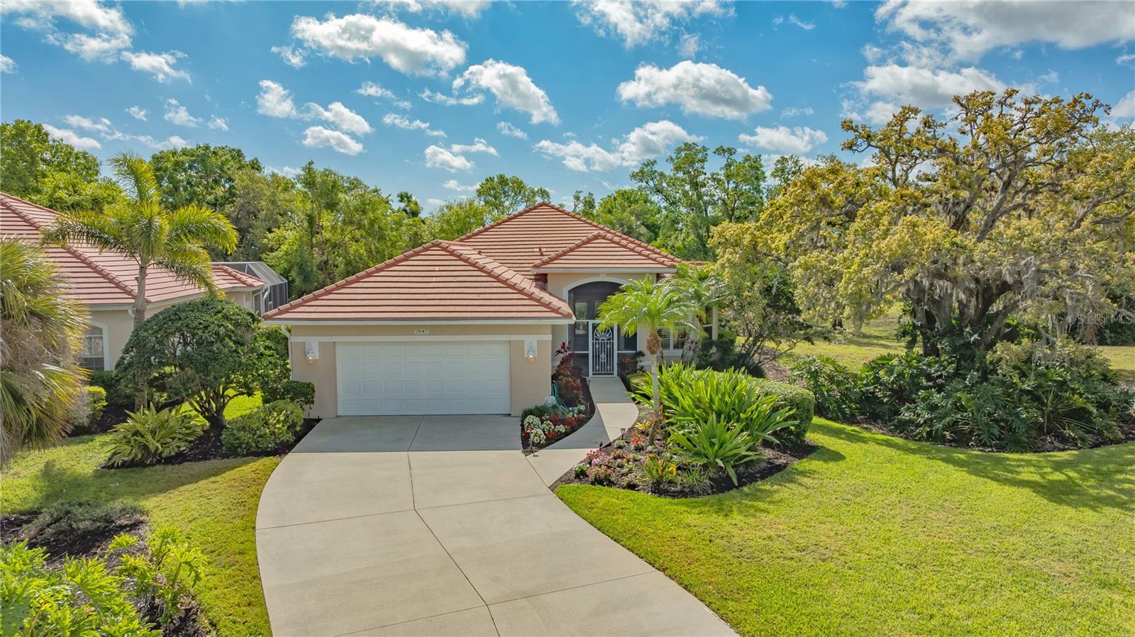 COMPLETELY UPDATED & TURN-KEY FURNISHED POOL HOME...located in the highly sought after community of Laurel Oak Estates! Enjoy modern comforts in this fully renovated 2-bedroom, 2-bathroom home plus den and an air-conditioned bonus room. Designed for both elegance and functionality, this move-in ready gem features a spacious gourmet kitchen with custom cabinetry, high-end stainless-steel appliances, granite countertops, and a breakfast bar. The open floor plan flows seamlessly into the bright living and dining areas, framed by large sliding doors that lead to the private outdoor retreat. The updated bathrooms showcase designer finishes, with a spa-like primary bath offering a walk-in shower, dual vanities, and ample storage. Step outside to your private screened lanai and pool, an ideal space for relaxation or entertaining. The home’s wood and tile flooring, tray ceilings, plantation shutters, and thoughtfully designed built-ins add warmth and sophistication throughout. Laurel Oak Estates & Country Club residents enjoy two championship golf courses, a state-of-the-art tennis center, a junior Olympic-sized swimming pool, and a clubhouse offering dining, events, and an active social calendar. With 24/7 gated security and meticulously maintained grounds. UPDATES: Tile Roof 2013, Washer 2023, Water Heater 2021, Pool Equipment, New Flooring, All New Kitchen and Appliances, All New Bathrooms, Fresh Paint, Crown Molding and so much more! Don’t miss the chance to own this meticulously updated home in one of Sarasota’s most sought-after country club communities—schedule your private showing today!