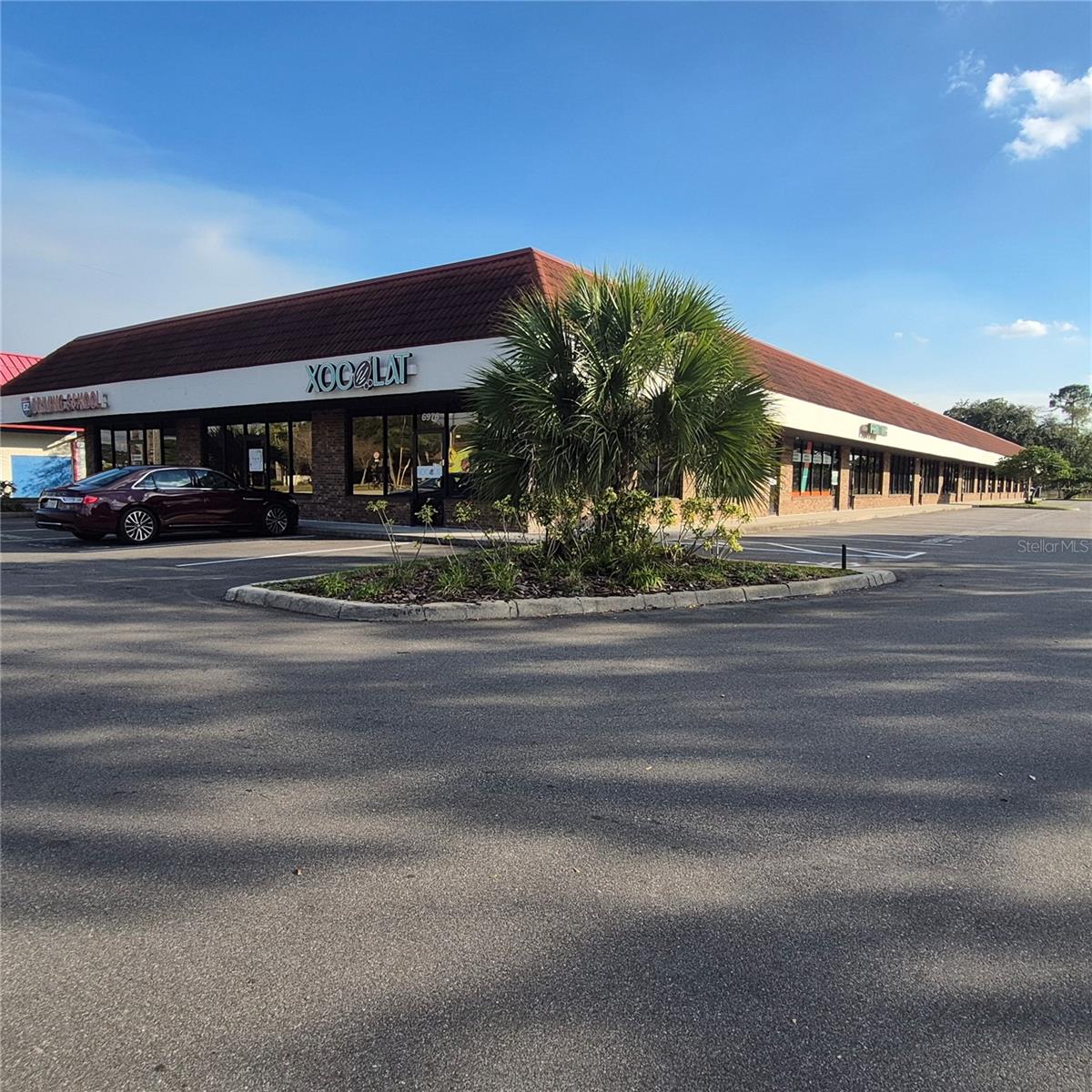 ALOMA BUS CENTER - Commercial Sale