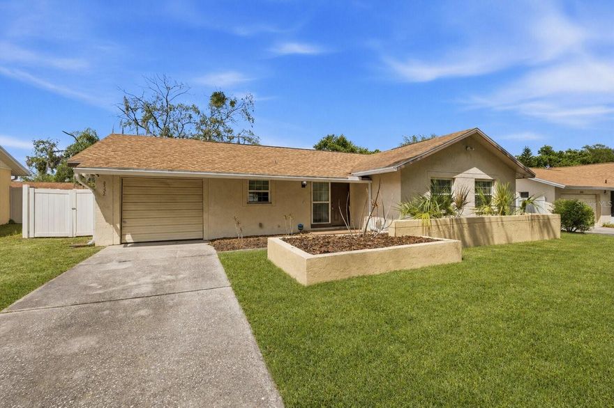 One or more photo(s) has been virtually staged. Welcome home to this beautifully updated 3-bedroom, 2-bathroom residence featuring a 1-car garage and a thoughtfully designed layout perfect for everyday living and entertaining. The heart of the home is the updated kitchen, complete with elegant quartz countertops, stainless steel appliances, and ample cabinet space. Enjoy both a dedicated dining room for gatherings and a spacious living room filled with natural light. Luxury vinyl plank flooring flows seamlessly throughout the home, offering durability and modern appeal. Step outside to a large screened-in lanai - ideal for relaxing or hosting - overlooking a fully fenced backyard with plenty of space for pets, play, or gardening. Additional features include a newer roof (2021) and AC (2017)! Located in a desirable community, residents enjoy access to fantastic amenities including a pool, tennis courts, and pickleball courts. This home combines comfort, style, and convenience - don’t miss your opportunity to make it yours! Up to $3,450 towards closing costs with our preferred lender!