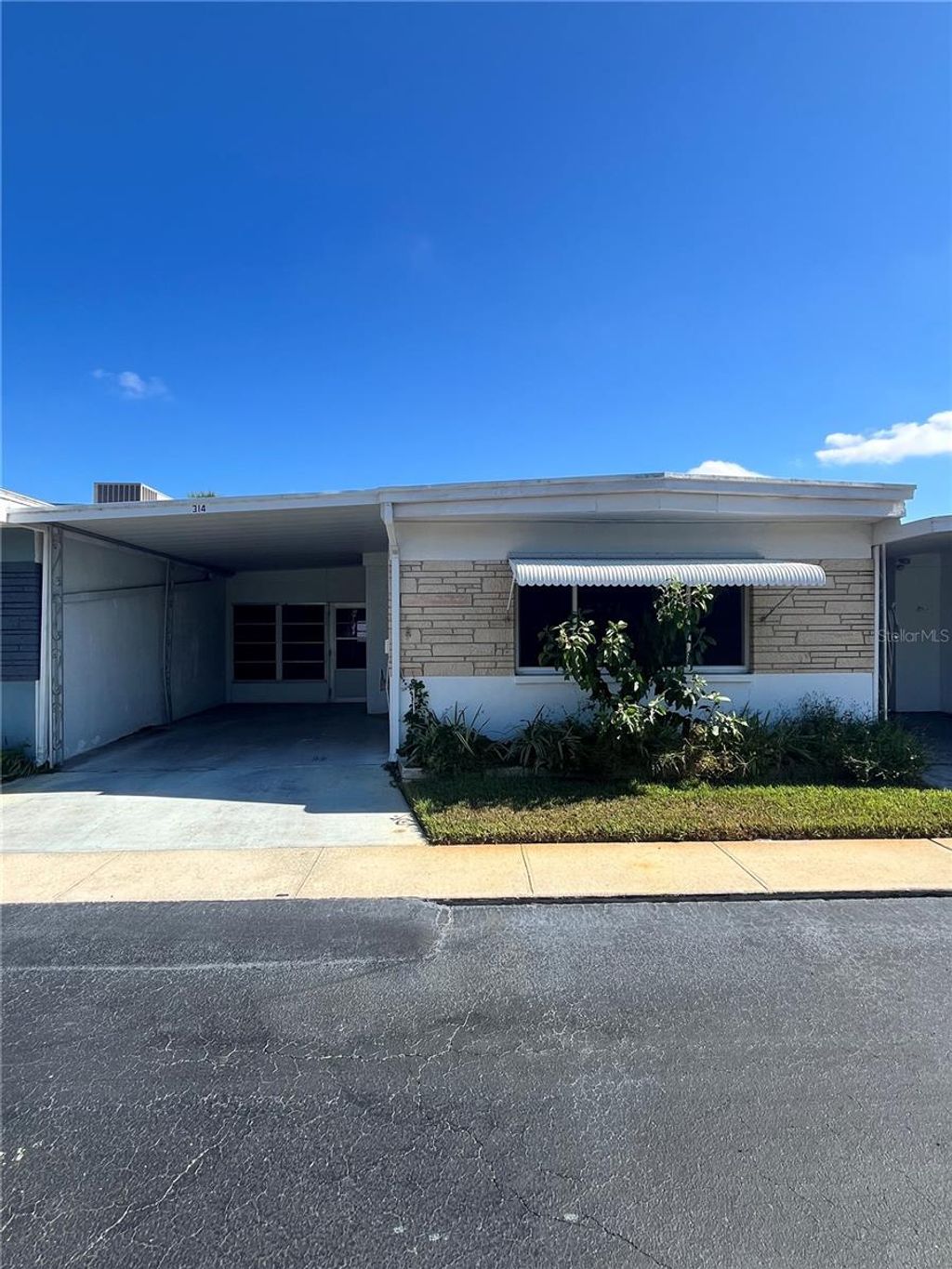 Photo of 250 NW Rosery Road #314, Largo, FL 33770 (MLS # TB8361043)