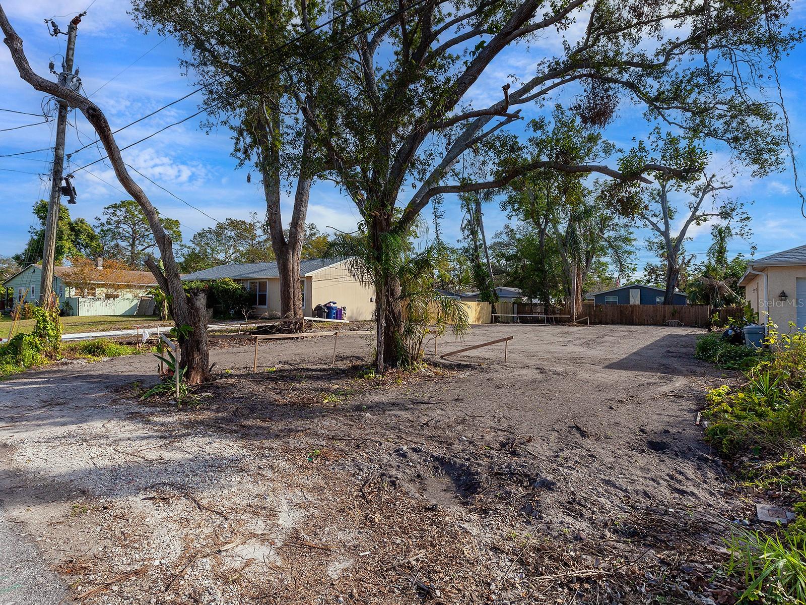 This prime building parcel offers an incredible opportunity to bring your vision to life in a sought-after location. Spanning 5,400 square feet, the lot is fully cleared and ready for immediate construction, with utilities in place, including water and electricity. In a thriving neighborhood, this parcel is ideally positioned only 1.5 miles to Riverview High School and only six miles to world famous Siesta Key, providing convenience and connectivity. Don’t miss out on this rare chance to create something special in one of the area's most promising areas.