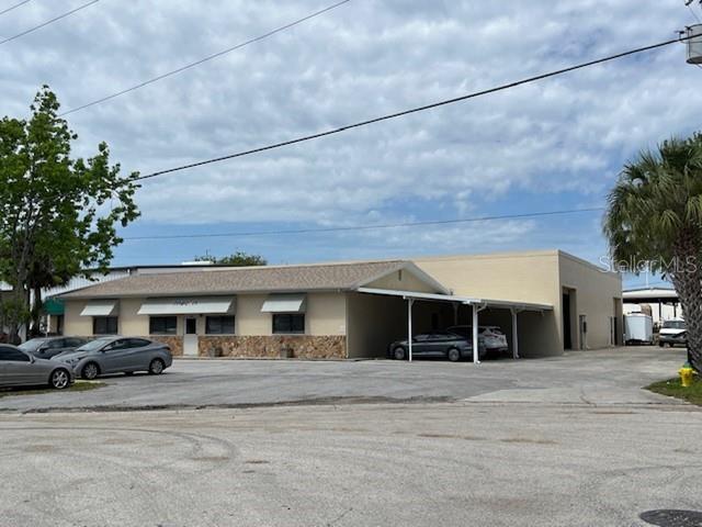 Presenting presents a Pinellas Park warehouse with adjoining office for sale. This property is a must see!
The building sites on ½ an acre and measures 8,280 SF. The office is 2,400 SF and the warehouse is 5,880 SF respectively. Situated just off US 19 and 118th Avenue N., this is a great opportunity for a buyer seeking a warehouse space with a large office. The warehouse is concrete with a metal roof, features two (2) roll up doors and 15 +/- feet of clear ceiling height which is ideal for those requiring plenty of vertical storage for supplies or inventory for manufacturing or distribution operations. In addition to the warehouse space, the property also boasts several offices, a conference room, a file room, a kitchen, breakroom and two universal restrooms; perfect for an owner-user needing a comfortable and spacious environment to start up, expand or relocate their business and manage operations. There is plenty of onsite parking of 14+ space and 4 covered parking spaces as well. Call today for a showing.