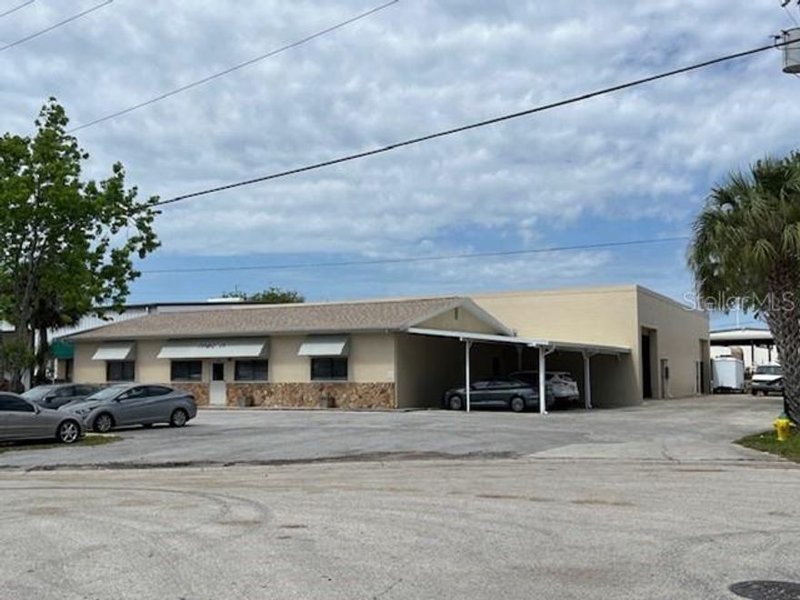 Florida Commercial Group presents a Pinellas Park warehouse with an adjoining office for sale. This property is currently a tenant occupied Investment :: Lease term ends January 31st 2026- with (3) 1 year tenant renewals- Enjoy lucrative income NOW and an owner/ user building that will have increased property values by 2029!
This property is a must see!  The building sits on ½ an acre and measures 8,280 SF. The office is 2,400 SF and the warehouse is 5,880 SF respectively. Situated just off US 19 and 118th Avenue N., this is a great opportunity for a buyer seeking a warehouse space with a large office.  The warehouse is concrete with a metal roof, features two (2) roll up doors and 15 +/- feet of clear ceiling height which is ideal for those requiring plenty of vertical storage for supplies or inventory for manufacturing or distribution operations.  In addition to the warehouse space, the property also boasts a large office space featuring several offices, a conference room, a file room, a kitchen, breakroom and two universal restrooms; perfect for an owner-user needing a comfortable and spacious environment to start up, expand or relocate their business and manage operations. There is plenty of onsite parking of 14+ spaces and 4 covered parking spaces as well.  Call today for a showing.
