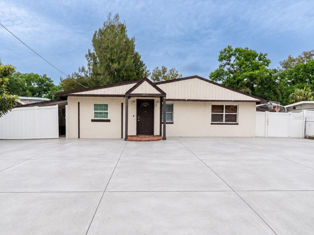 Photo of 8819 W Broad Street, Tampa, FL 33615 (MLS # TB8559239)