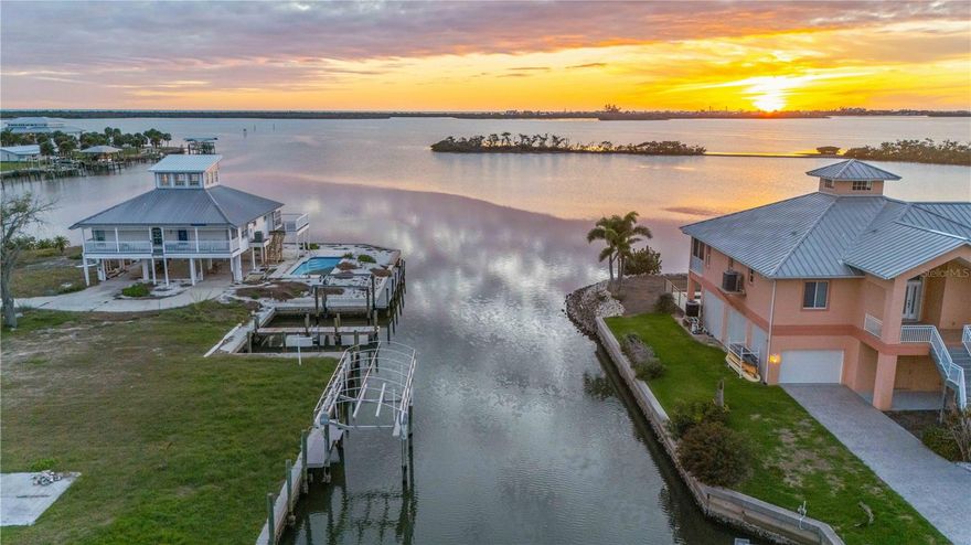 Welcome to your piece of a paradise and the soon to be location of your future dream home! This stunning property offers direct sailboat water access to the Gulf with 100ft of waterfront. The property provides a view rarely found on other parcels and in additional to the boat lift there is a dock as well allowing you to utilize two boats! The current owner cleared this lot last year and spent 1000s on a custom designed home with floorplans he can share with the buyer situating the home perfectly to enjoy our stunning Florida sunsets. The property has a concrete seawall, composite dock, 10,000lb lift, boat cover, and the city water & public sewer connection has been maintained to reduce future connection fees! This location provides nearby access to countless top destinations including Manasota Key, Cape Haze, Boca Grande, Captiva, Pine Island, Casey Key, and Siesta Key!!