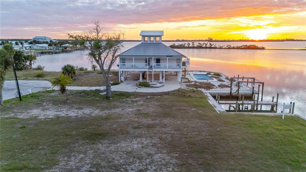 Photo of 1908 Michigan Avenue, Englewood, FL 34224 (MLS # C7520036)