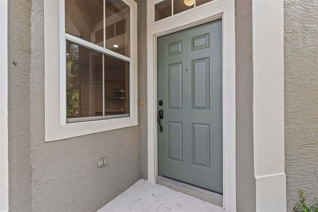 Photo of 3350 Covered Bridge Drive W, Dunedin, FL 34698 (MLS # TB8521723)