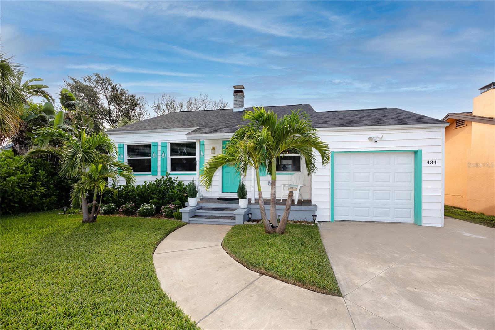 Completely renovated from the ground up, this 3-bedroom, 2-bathroom single-family home with a 1-car garage offers the perfect turnkey opportunity in one of Florida’s most desirable beach towns. Every detail has been reimagined for modern living, with all-new electrical, plumbing, insulation, roof (2023), hurricane-rated windows, and luxury vinyl flooring throughout—making this home fully move-in ready.
Inside, the open floor plan is anchored by a chic coastal design with clean lines, gold fixtures, and a modern stone fireplace as the living room centerpiece. The kitchen is both functional and stylish, featuring quartz countertops, upgraded white cabinetry, a glass cooktop range, a built-in oven, and a spacious cooking island with breakfast bar seating. A barn door closet and private slider access highlight one of the rear bedrooms, while the second rear bedroom offers flexibility to be converted into a private-entry guest suite—an ideal setup for intergenerational living, long-term guests, or income-producing potential. Both bathrooms showcase fully updated tiled showers and sleek modern vanities.
Outdoor living is just as impressive, with a newly installed brick paver patio, landscaped private fenced yard, outdoor shower, and plenty of space to add a pool. The elevated HVAC condenser and built-in garage storage—perfect for bikes, paddleboards, or kayaks—add both functionality and peace of mind.
Whether as a stylish primary residence, a vacation retreat, or an investment property with rental and guest-suite potential, this turnkey home places you just minutes from the white sands of St. Pete Beach, local shops, top restaurants, and vibrant downtown St. Petersburg. A rare opportunity to own a completely reimagined coastal home in the heart of St. Pete Beach.