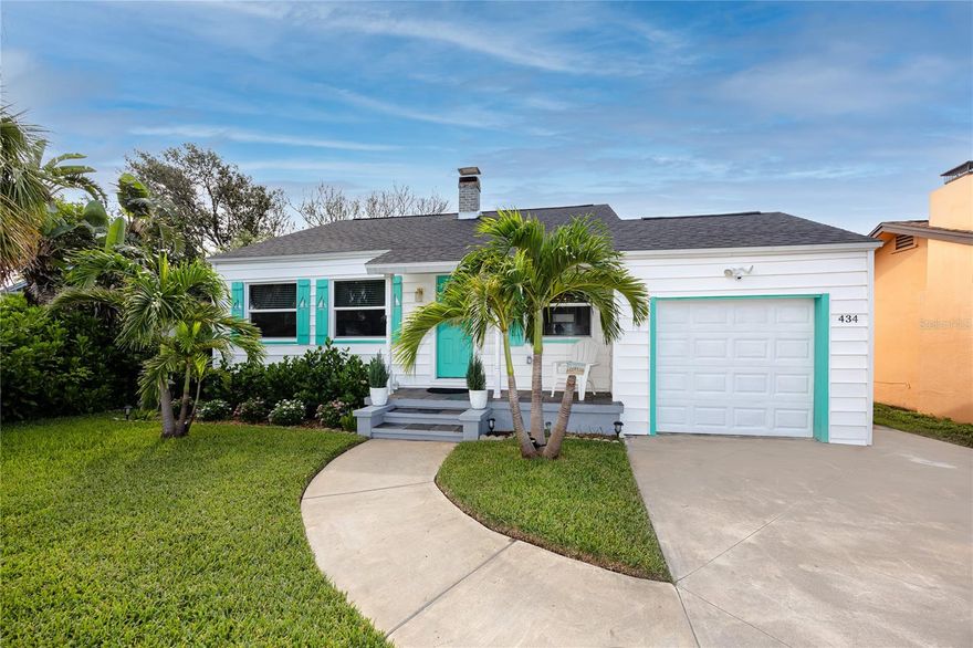 Completely renovated from the ground up, this 3-bedroom, 2-bathroom single-family home with a 1-car garage offers the perfect turnkey opportunity in one of Florida’s most desirable beach towns. Every detail has been reimagined for modern living, with all-new electrical, plumbing, insulation, roof (2023), hurricane-rated windows, and luxury vinyl flooring throughout—making this home fully move-in ready.

Inside, the open floor plan is anchored by a chic coastal design with clean lines, gold fixtures, and a modern stone fireplace as the living room centerpiece. The kitchen is both functional and stylish, featuring quartz countertops, upgraded white cabinetry, a glass cooktop range, a built-in oven, and a spacious cooking island with breakfast bar seating. A barn door closet and private slider access highlight one of the rear bedrooms, while the second rear bedroom offers flexibility to be converted into a private-entry guest suite—an ideal setup for intergenerational living, long-term guests, or income-producing potential. Both bathrooms showcase fully updated tiled showers and sleek modern vanities.

Outdoor living is just as impressive, with a newly installed brick paver patio, landscaped private fenced yard, outdoor shower, and plenty of space to add a pool. The elevated HVAC condenser and built-in garage storage—perfect for bikes, paddleboards, or kayaks—add both functionality and peace of mind.

Whether as a stylish primary residence, a vacation retreat, or an investment property with rental and guest-suite potential, this turnkey home places you just minutes from the white sands of St. Pete Beach, local shops, top restaurants, and vibrant downtown St. Petersburg. A rare opportunity to own a completely reimagined coastal home in the heart of St. Pete Beach.